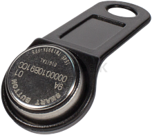 TM1990A iButton TS (чёрный) Ключ Touch Memory TM1990A-F5 с пластиковым держателем чёрного цвета. Cодержит записанный лазером регистрационный номер, который включает уникальный 48-битный заводской номер, 8 бит CRC и 8-битный код семейства (01H). Обмен данн